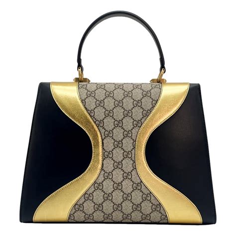 gucci osiride|Gucci Osiride GG Supreme Top Handle Bag Medium Gold/Black.